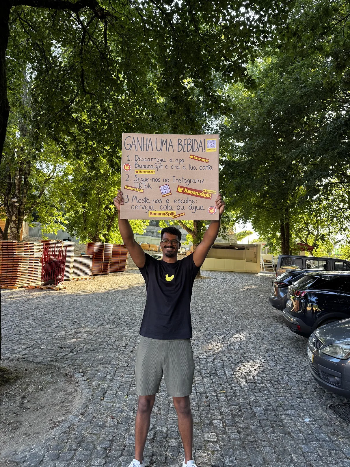 BananaSplit team member holding up the campaign sign